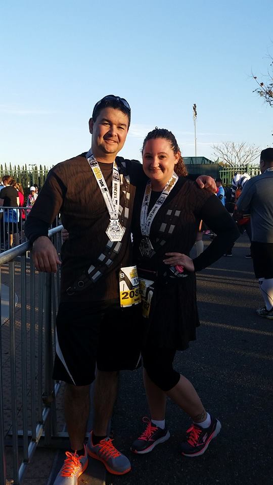 DIStracted editor Renee and her husband Manny show off their awesome Chewbacca costumes and their shiny 10K medals.  