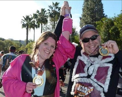 The Star Wars Half Marathon Medal was inspired by the medals that were given to Luke and Han after the battle of Yavin. DIStracted husband and I happily pose with ours at the finish line. 
